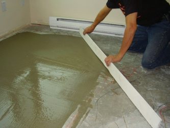 Как выровнять бетонный пол после заливки?